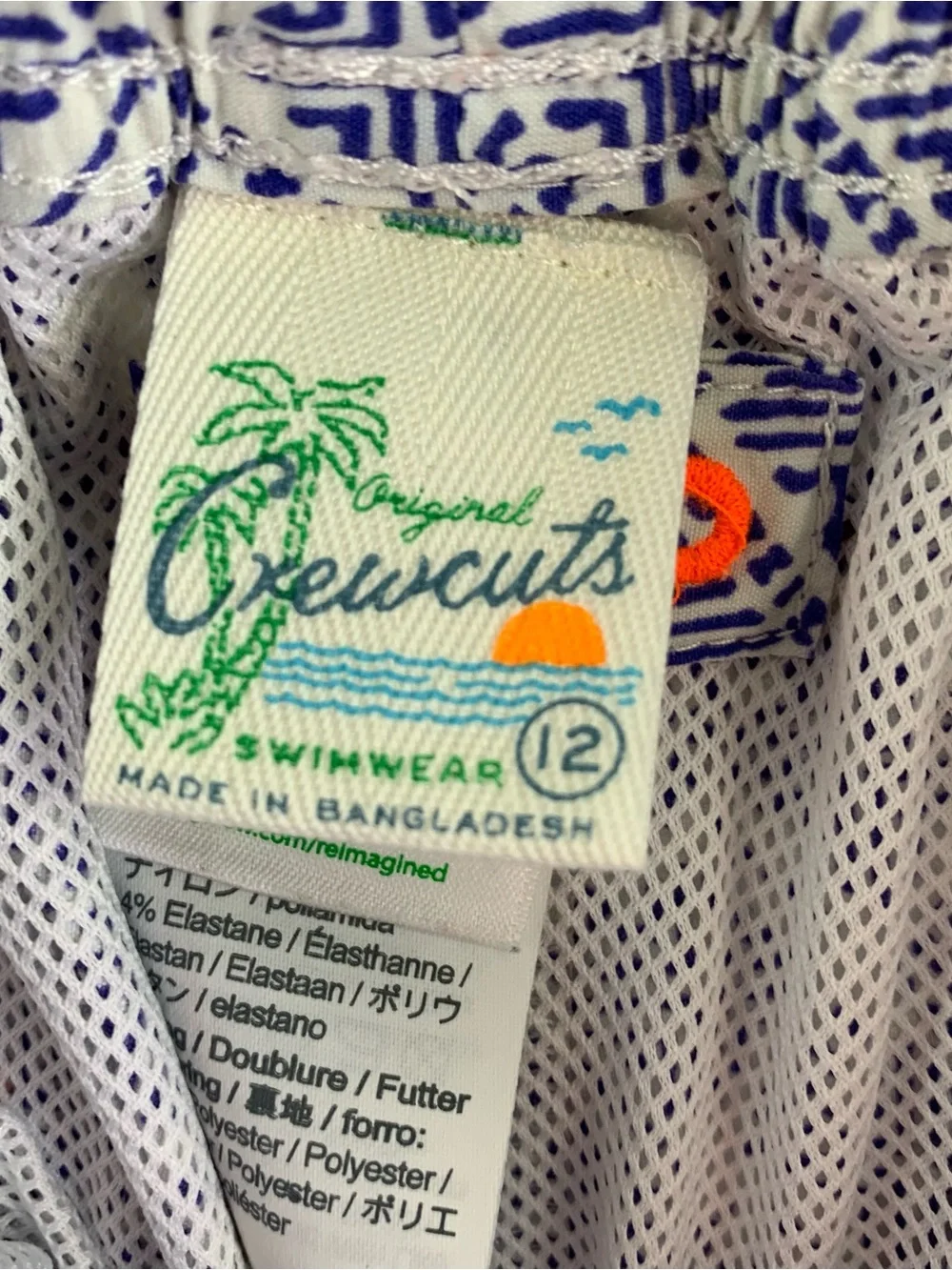 Crewcuts Blue Geometric Swim Trunks with Coral Drawstring